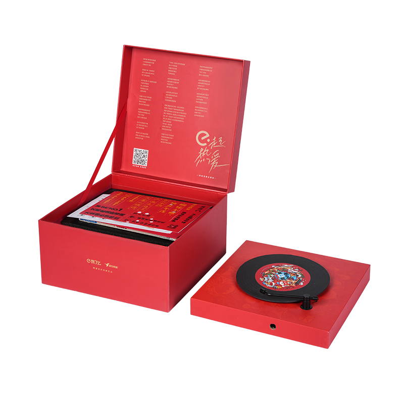 Caixa de música giratória em forma de livro com tema natalino