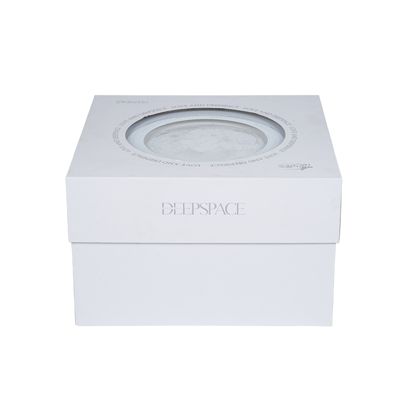 Caixa de música giratória em forma de livro com tema natalino